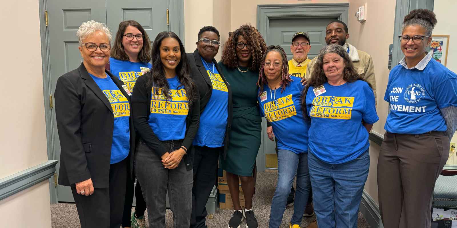 Advocates posing for photo with Rep.Johnson